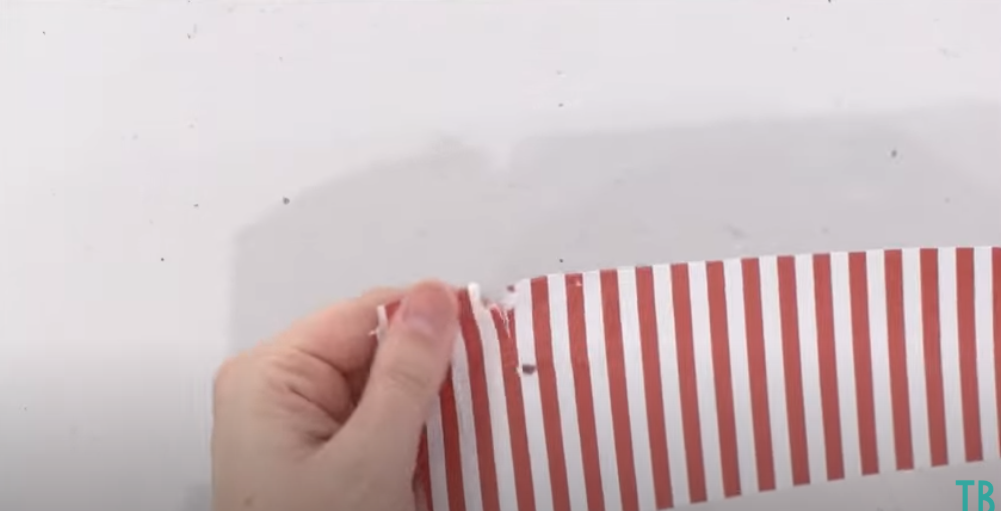 Piece Of Paper Looks All Chewed Up By Blade