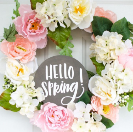 Flower Spring Wreath Plaque with a text in the middle that says Hello Spring!