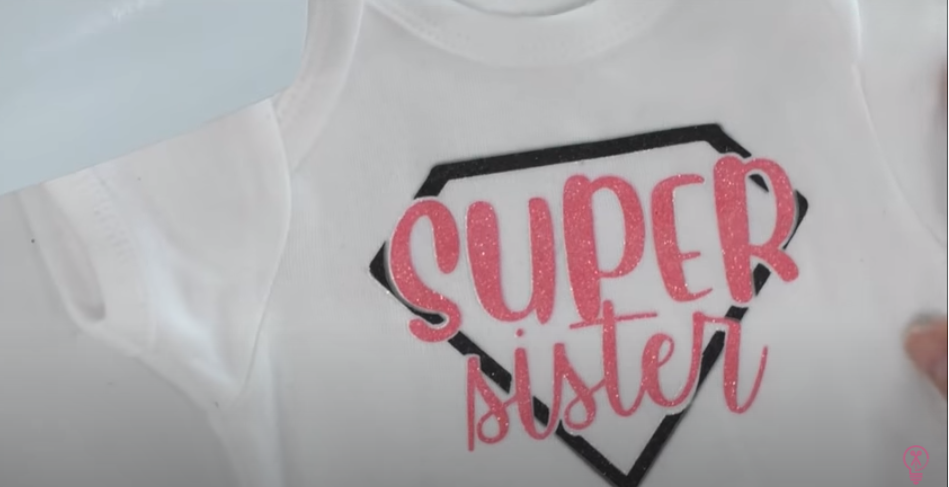 Onesie With Super Sister Design On It
