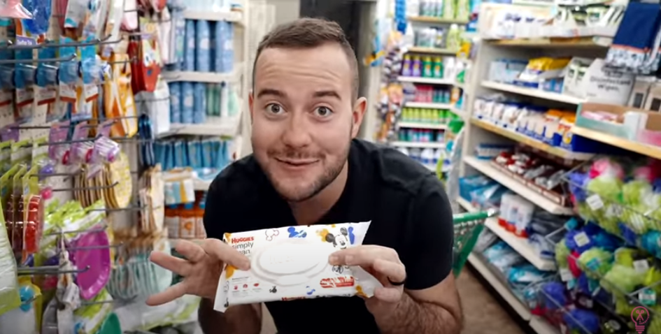 Man Holding A Package Of Baby Wipes