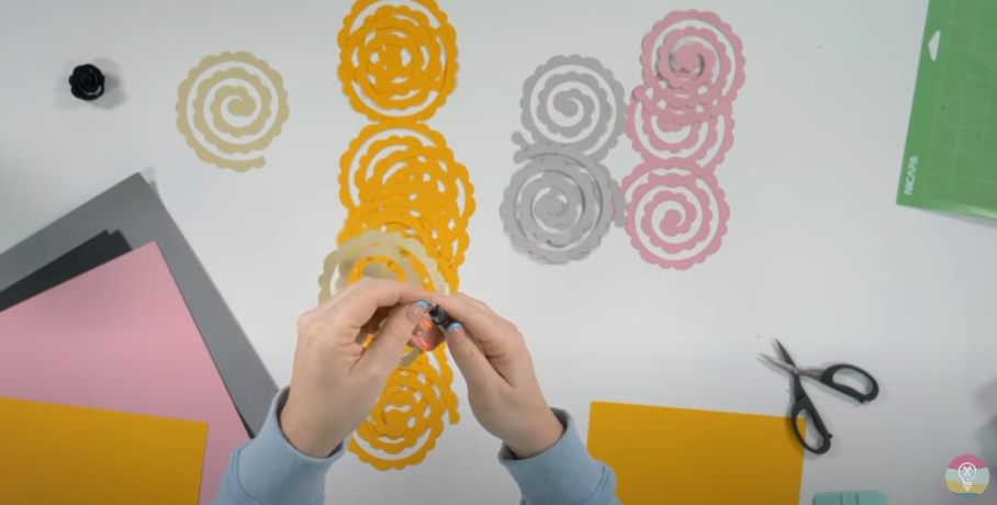 Place The Outer End Of The Flower Spiral Into The Quilling Tool